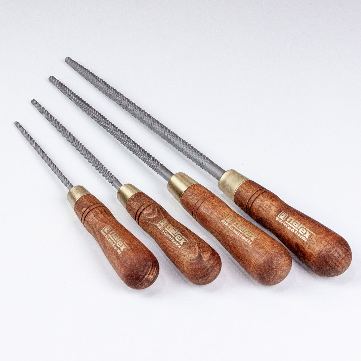 A set of 4 round rasps sitting on a white background.