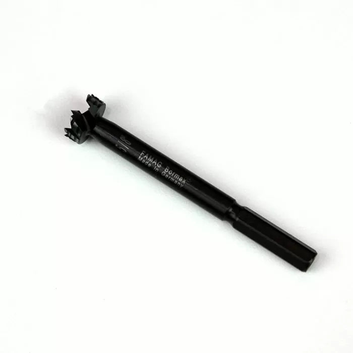 Forstner drill bit with hex shank for woodworking on white background