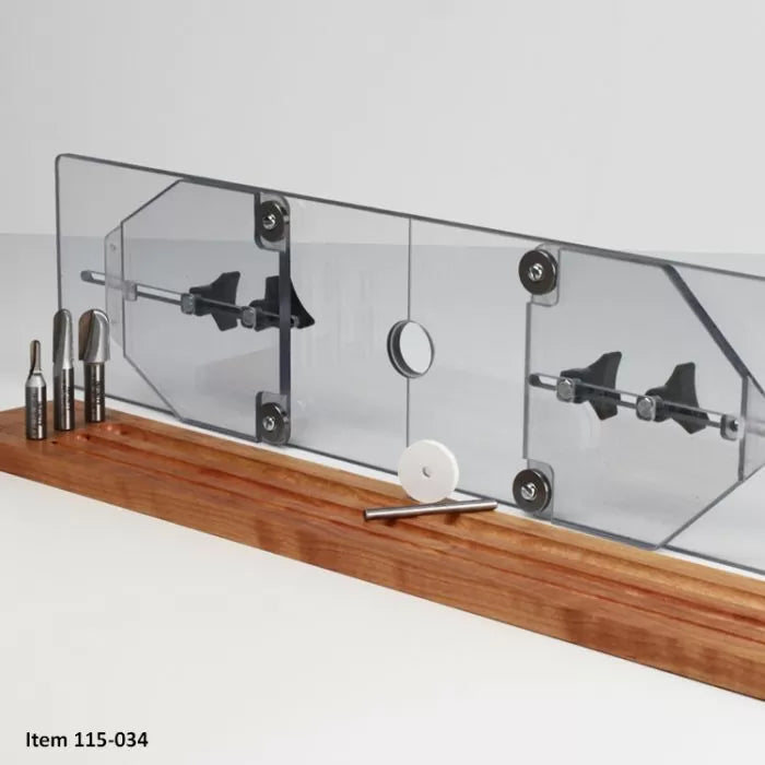 Clear acrylic router table safety guard with wood base and router bits for woodworking