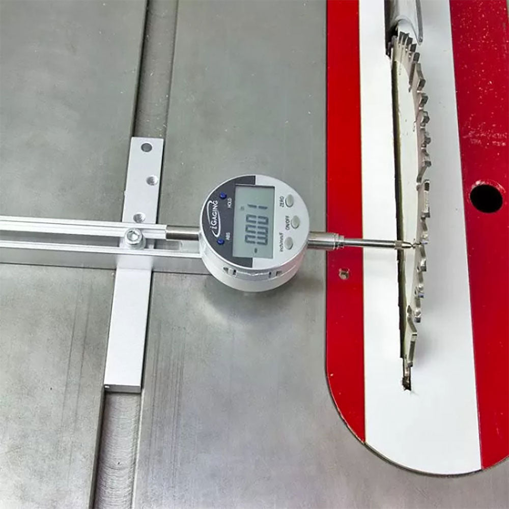 Measuring gauge on a table saw measuring blade straightness