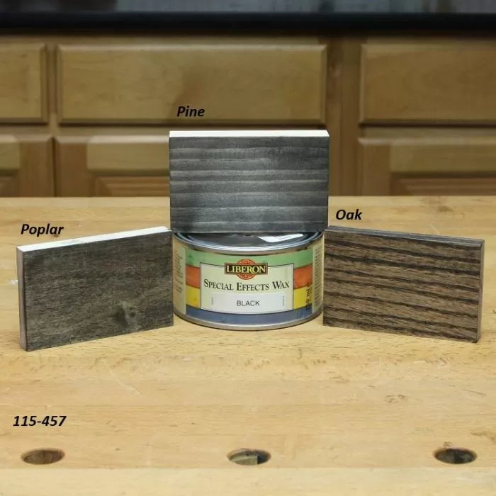 Wood finish samples of poplar, pine, and oak with Liberon Special Effects Wax on a workbench.