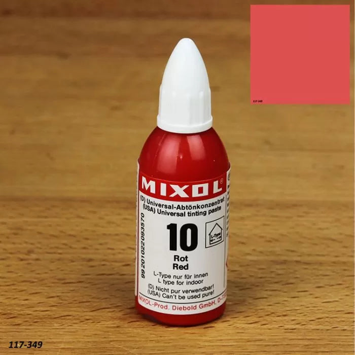 Red Mixol universal tinting paste bottle for wood finishing on a wooden surface