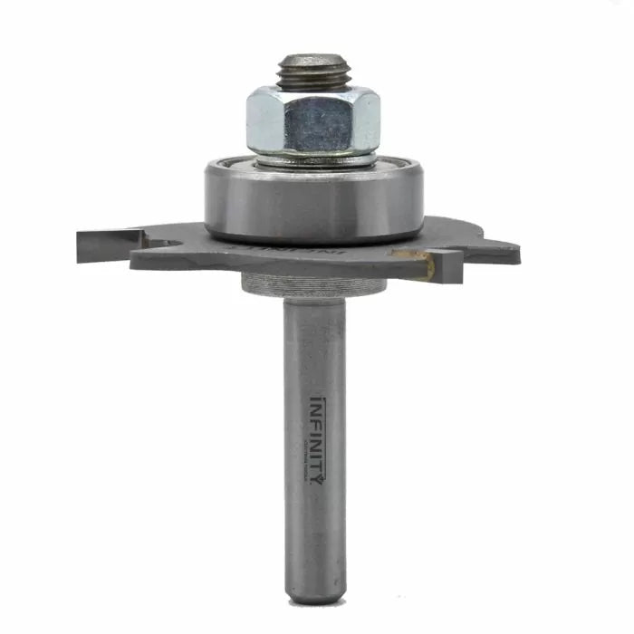 Carbide router bit with bearing and washer, woodworking tool on white background