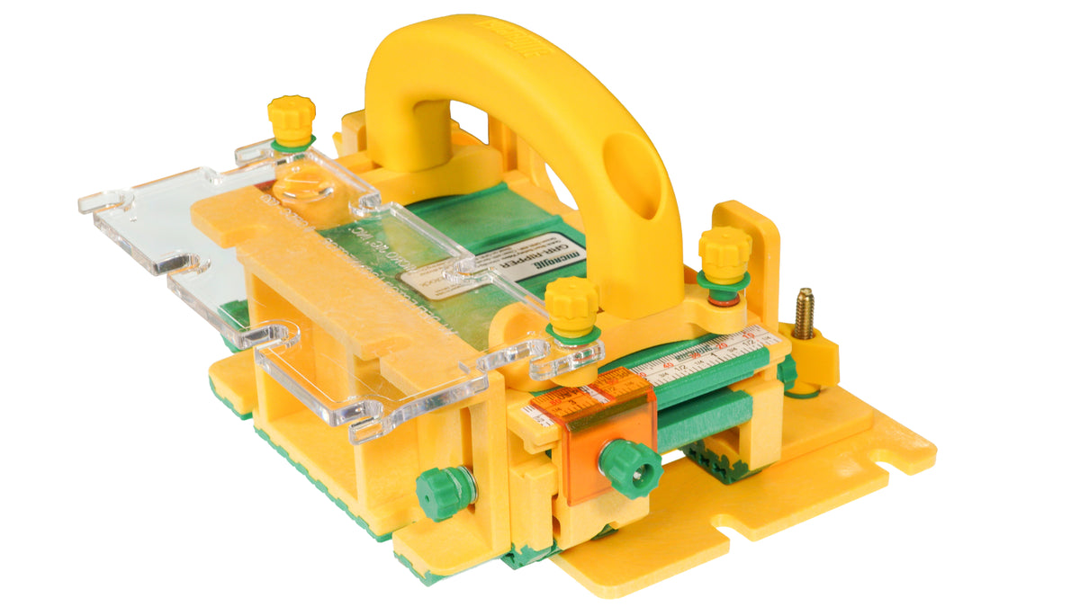 A yellow and green push block on a white background.