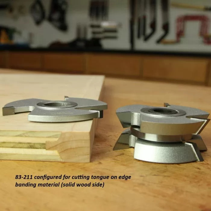 Tongue cutting woodworking router bits and edge banding material on workshop table