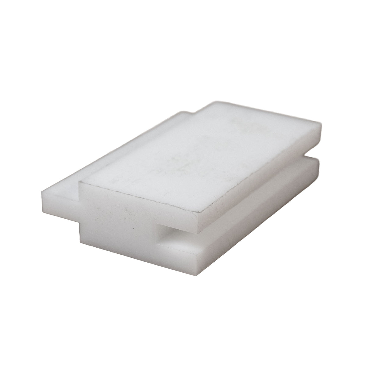 White plastic setup block shown on white background.