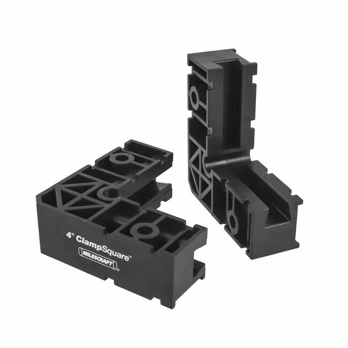 Black 4-inch clamp squares for woodworking, ideal for holding corners at 90 degrees.