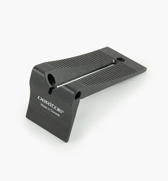Black Veritas woodworking featherboard tool on white background