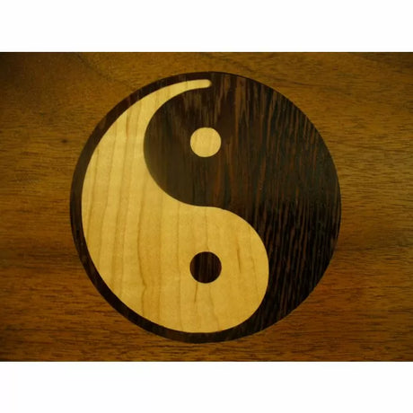 Yin-yang wood inlay in light and dark contrasting woods