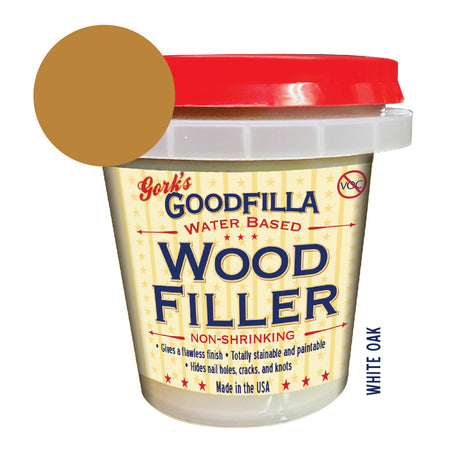 Tub of Goodfilla water-based wood filler in White Oak with color swatch