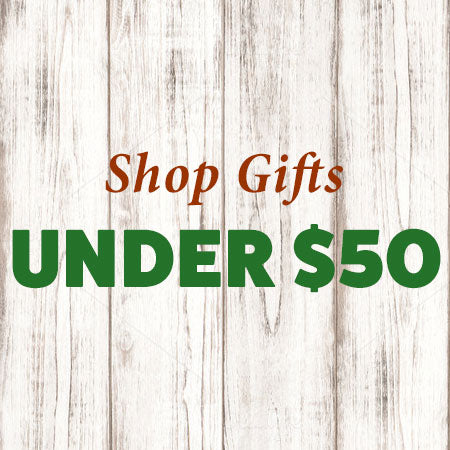 Shop Gifts Under $50 text on a whitewashed wood background