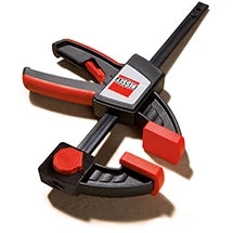 BESSEY one-handed trigger clamp with red and black jaws