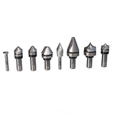 Assorted woodworking router bits set with various cutting profiles on white background