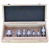 Woodworking router bit set in wooden case, six steel bits organized in a row