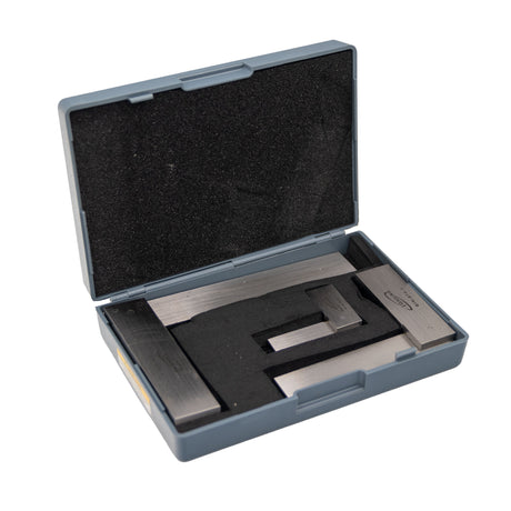 Precision woodworking square set in foam-lined plastic case on white background