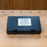 Closed Infinity Tools Precision Setup Blocks storage case on a workbench