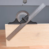 Protractor square measuring angle on wooden board in woodworking shop