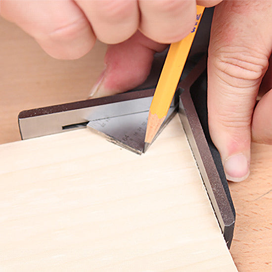Person marking wood with a pencil and precision woodworking square tool for accurate cuts