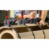 Adjustable band clamps securing curved wood for woodworking project