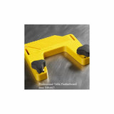 Yellow professional table featherboard for woodworking on a metal work surface