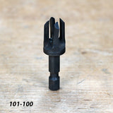 Woodworking countersink drill bit with hex shank on a wooden workbench