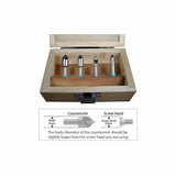 Four-piece countersink drill bit set in wooden box with sizing diagram for woodworking.