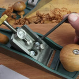 Adjusting frog screws with hex key on woodworking hand plane tool