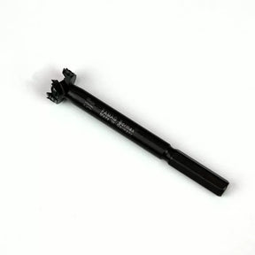 Black woodworking Forstner drill bit with hex shank on white background