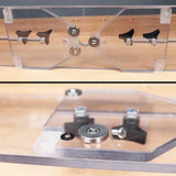 Clear acrylic woodworking router base plate with guide bearings and mounting hardware