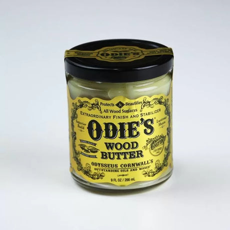 Odie's Wood Butter jar for wood finish and protection, yellow label, black lid, 9 fl oz