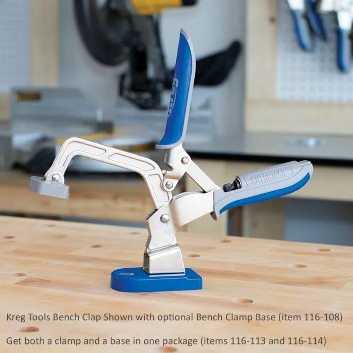 Bench clamp with blue handle mounted on woodworking workbench in workshop setting