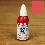 Mixol true red universal tinting paste bottle for woodworking on wooden surface