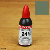 Mixol oxide stone grey tinting paste bottle with red cap on wood surface, color swatch inset