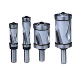 Set of four flush trim router bits for woodworking, various sizes, on white background