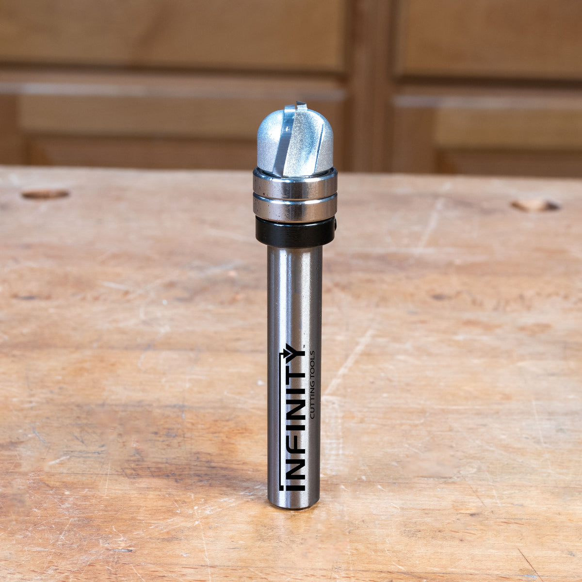 Bowl and tray router bit with bearing on a wooden workbench