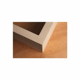 Close-up of a precisely cut mitered corner joint on MDF wood panel for woodworking projects