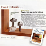 Lapped miter router bits on display with wood sample, woodworking magazine and article text.