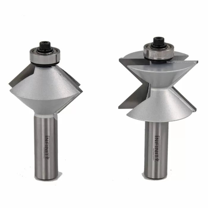 Set of two woodworking router bits with carbide blades and bearing guides on white background