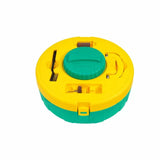 Circular yellow and green saw blade cleaning kit with brush and compartments