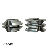 Set of two metal woodworking router bit cutters with stacked profiles on white background