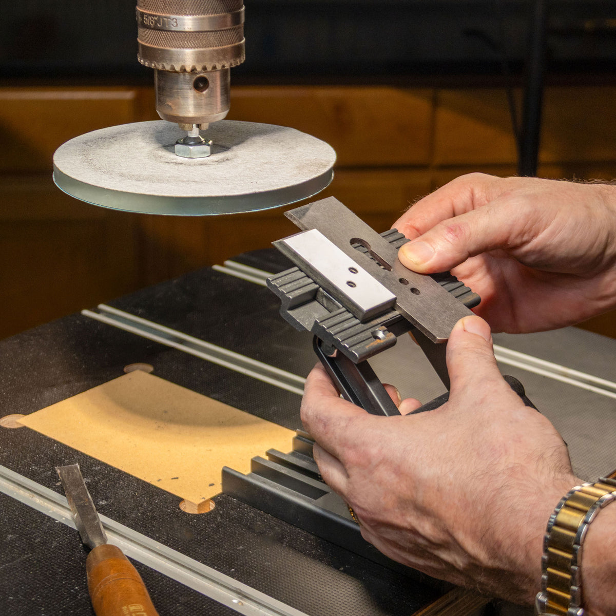 Infinity Tools Drill Press Sharpening Station in use on a drill press