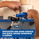 Woodworker using a pocket hole jig and clamp to join wooden boards on a workbench.