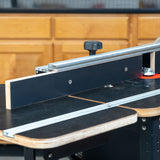Router table extension fence with MDF fence faces in a woodworking shop closeup