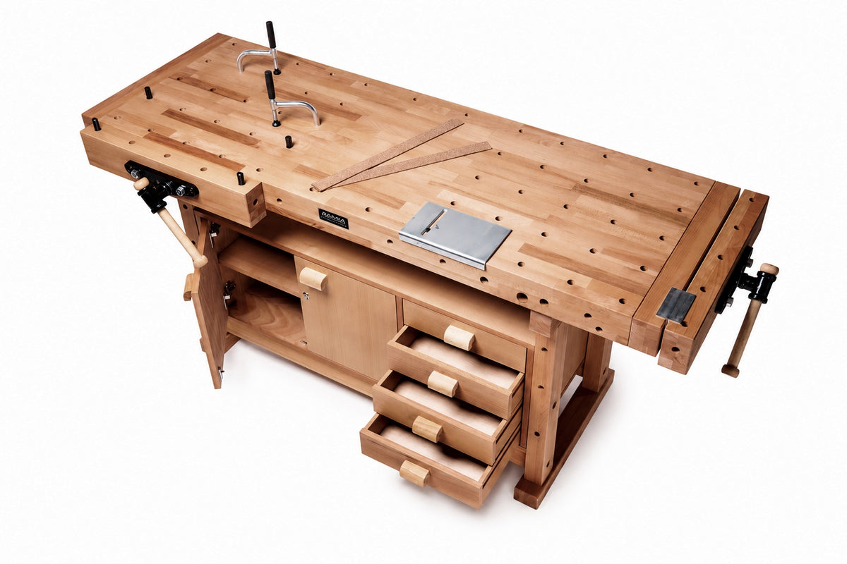 A wooden workbench with a light natural wood finish, featuring a flat work surface with pre-drilled holes, a metal guide, a lower cabinet compartment with an open door, three drawers with pull handles, and clamps on both ends, shown on a white background.