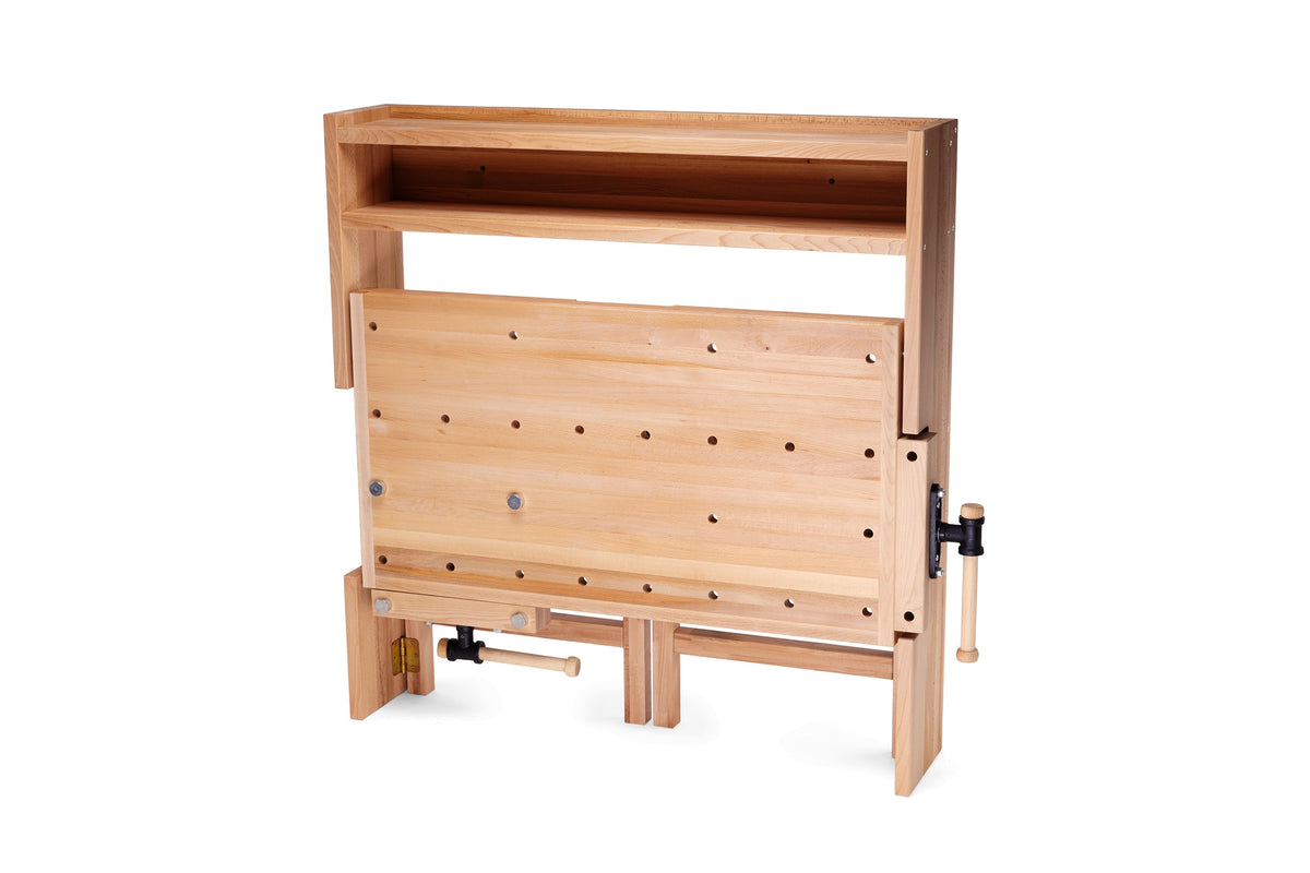 A light natural wood folding workbench with a top shelf, adjustable legs, and a crank handle on the right side, shown against a plain white background.