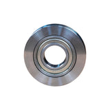 Close-up of a metal router bit bearing for woodworking tools on a white background.