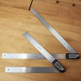 Digital angle rulers with stainless steel blades on wood workbench, woodworking measuring tools