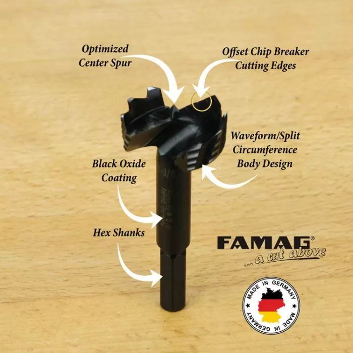 FAMAG woodworking drill bit with optimized center spur, chip breaker cutting edges, black oxide coating, hex shank, and waveform body design on wood surface.
