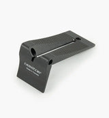 Black Veritas woodworking featherboard tool on white background