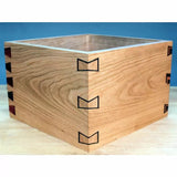 Wooden box with decorative inlaid dovetail joinery, perfect for woodworking projects